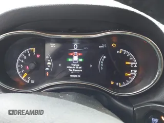 2014 Jeep Grand Cherokee Limited z VIN 1C4RJFBG8EC466380, wystawiony jako IAAI lot #38710809 z przebiegiem 169 540 mil mil oraz . Historia ofert i sprzedaży dostępna na DreamBid. Obrazek 7.