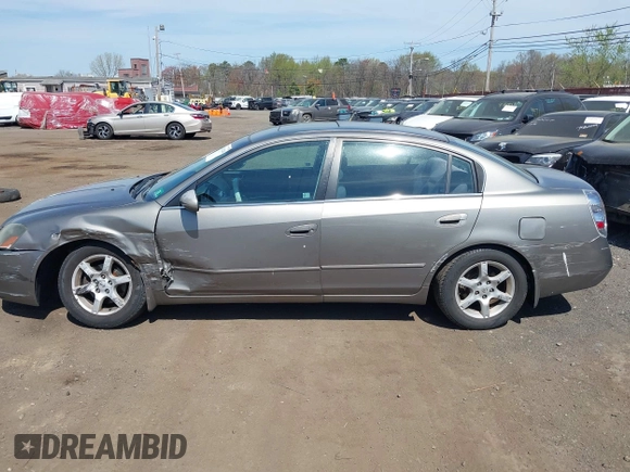 2006 Nissan Altima S with VIN 1N4AL11E76N414440, listed as a IAAI auction lot 42102394 with 153,079 mi miles and . Bid and sale history available at DreamBid. Image 14.