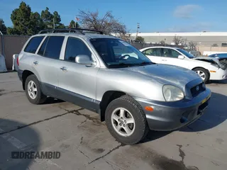 2002 Hyundai Santa Fe GLS z VIN KM8SC13D92U168392, wystawiony jako IAAI lot #41600055 z przebiegiem 195 395 mil mil oraz . Historia ofert i sprzedaży dostępna na DreamBid. Obrazek 1.