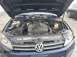 2013 Volkswagen Touareg Lux z VIN WVGEF9BP0DD000495, wystawiony jako IAAI lot #41711365 z przebiegiem 116 223 mil mil oraz . Historia ofert i sprzedaży dostępna na DreamBid. Obrazek 10.