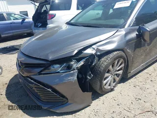 2019 Toyota Camry LE z VIN 4T1B11HK4KU797720, wystawiony jako IAAI lot #42053830 z przebiegiem 102 558 mil mil oraz . Historia ofert i sprzedaży dostępna na DreamBid. Obrazek 6.