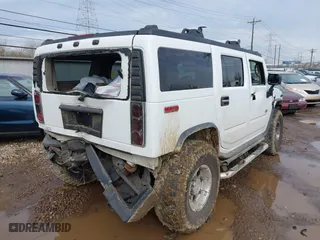 2004 Hummer H2 with VIN 5GRGN23U64H122670, listed as a IAAI auction lot 41908517 with 189,736 mi miles. Bid and sale history available at carsss.com. Image 4.