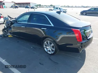 2016 Cadillac CTS Luxury Collection RWD z VIN 1G6AR5SS8G0156144, wystawiony jako IAAI lot #42087602 z przebiegiem Nie podano mil oraz . Historia ofert i sprzedaży dostępna na DreamBid. Obrazek 3.
