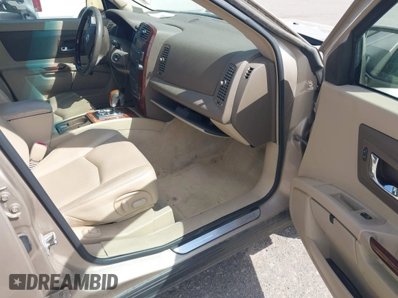 2006 Cadillac SRX z VIN 1GYEE637860206995, wystawiony jako IAAI lot #42338856 z przebiegiem 163 773 mil mil oraz . Historia ofert i sprzedaży dostępna na DreamBid. Obrazek 5.