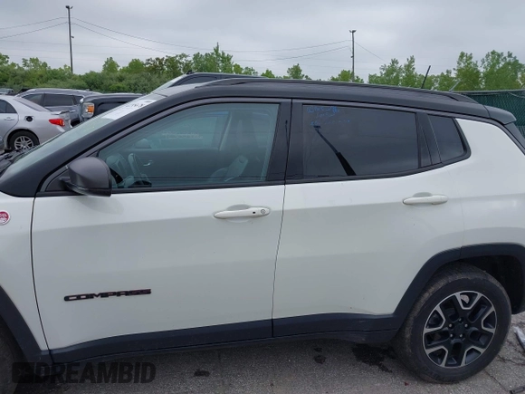 2020 Jeep Compass Trailhawk z VIN 3C4NJDDB8LT195584, wystawiony jako IAAI lot #42295678 z przebiegiem 99 762 mil mil oraz . Historia ofert i sprzedaży dostępna na DreamBid. Obrazek 15.