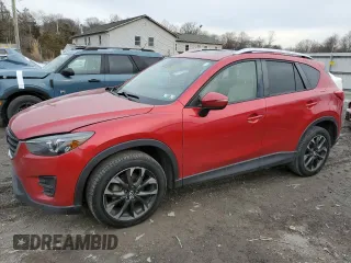 2016 Mazda CX-5 Grand Touring with VIN JM3KE4DY5G0730053, listed as a Copart auction lot 43776155 with 157,399 mi miles and Salvage Title. Bid and sale history available at carsss.com. Image 1.