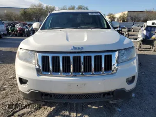 2011 Jeep Grand Cherokee Laredo with VIN 1J4RR4GG5BC503705, listed as a Copart auction lot 50014895 with 180,999 mi miles and Salvage title. Bid and sale history available at DreamBid. Image 5.