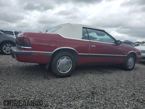 1989 Chrysler LeBaron z VIN 1C3XJ45J8KG223051, wystawiony jako Copart lot #75115464 z przebiegiem 27 923 mil mil oraz Szkody całkowita. Historia ofert i sprzedaży dostępna na DreamBid. Obrazek 3.