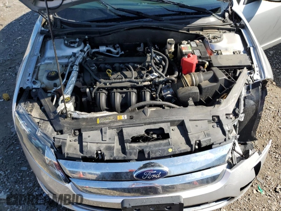 2012 Ford Fusion SE z VIN 3FAHP0HA8CR432289, wystawiony jako Copart lot #58714925 z przebiegiem 59 201 mil mil oraz Szkoda całkowita • Salvage title. Historia ofert i sprzedaży dostępna na DreamBid. Obrazek 11.