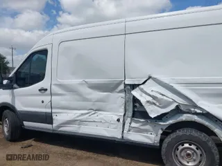 2018 Ford Transit Cargo Van with VIN 1FTYR2CG9JKA51600, listed as a IAAI auction lot 42026514 with 57,484 mi miles. Bid and sale history available at carsss.com. Image 14.