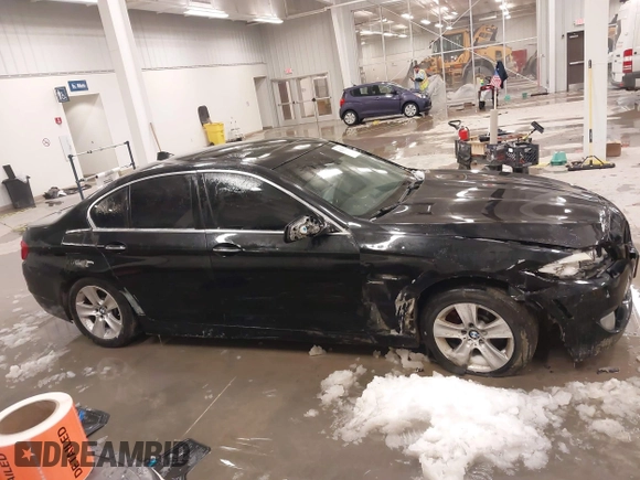 2012 BMW 5 Series 528i xDrive with VIN WBAXH5C51CDW03156, listed as a IAAI auction lot 41236722 with 189,196 mi miles and . Bid and sale history available at DreamBid. Image 13.