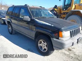 1996 Jeep Grand Cherokee Laredo with VIN 1J4GZ58S3TC345107, listed as a IAAI auction lot 41661884 with 179,175 mi miles. Bid and sale history available at carsss.com. Image 1.