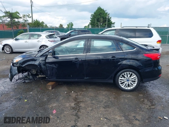 2016 Ford Focus Titanium z VIN 1FADP3J27GL215436, wystawiony jako IAAI lot #42709166 z przebiegiem 75 956 mil mil oraz . Historia ofert i sprzedaży dostępna na DreamBid. Obrazek 15.