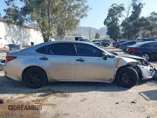 2016 Lexus ES 330 z VIN JTHBK1GG4G2236076, wystawiony jako IAAI lot #42124873 z przebiegiem 118 102 mil mil oraz . Historia ofert i sprzedaży dostępna na DreamBid. Obrazek 13.