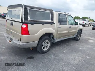 2005 Ford Explorer Sport Trac XLS z VIN 1FMZU67K85UA94565, wystawiony jako IAAI lot #42172948 z przebiegiem 173 517 mil mil oraz . Historia ofert i sprzedaży dostępna na DreamBid. Obrazek 4.