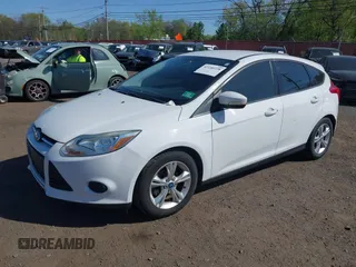2013 Ford Focus SE with VIN 1FADP3K26DL262144, listed as a IAAI auction lot 42140228 with 107,379 mi miles. Bid and sale history available at carsss.com. Image 6.