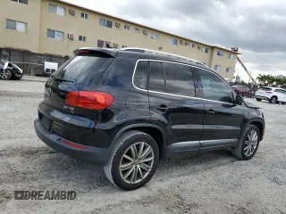 2014 Volkswagen Tiguan SE with VIN WVGAV3AXXEW543245, listed as a Copart auction lot 42288905 with 92,851 mi miles and Salvage title. Bid and sale history available at DreamBid. Image 3.