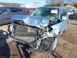 2009 Mercury Mariner Hybrid with VIN 4M2CU29359KJ04974, listed as a IAAI auction lot 41737749 with 150,783 mi miles. Bid and sale history available at carsss.com. Image 6.