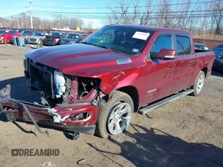 2019 Ram 1500 Big Horn/Lone Star with VIN 1C6SRFFT2KN647936, listed as a IAAI auction lot 41294403 with 123,834 mi miles. Bid and sale history available at carsss.com. Image 22.