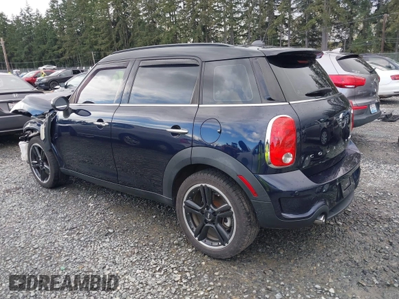 2015 MINI Countryman S z VIN WMWZC3C57FWT06297, wystawiony jako IAAI lot #41988157 z przebiegiem 74 461 mil mil oraz . Historia ofert i sprzedaży dostępna na DreamBid. Obrazek 3.