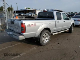 2002 Nissan Frontier SC z VIN 1N6MD29Y12C326737, wystawiony jako Copart lot #63475954 z przebiegiem 199 337 mil mil oraz Czysty tytuł • Clean title. Historia ofert i sprzedaży dostępna na DreamBid. Obrazek 3.