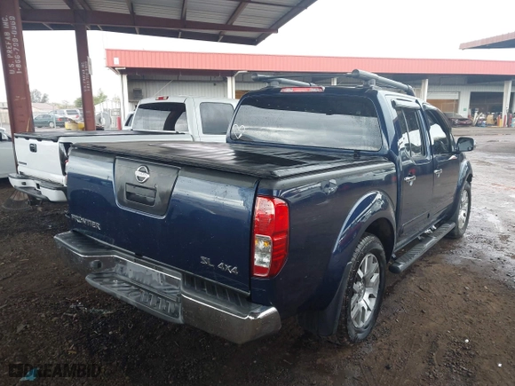 2011 Nissan Frontier PRO-4X with VIN 1N6AD0EV7BC426151, listed as a IAAI auction lot 41751873 with 152,464 mi miles. Bid and sale history available at carsss.com. Image 4.