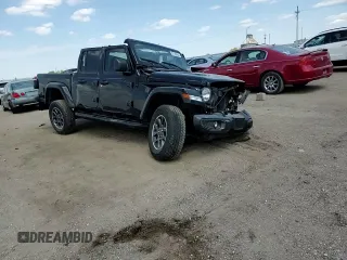 2021 Jeep Gladiator 80th Anniversary с VIN 1C6HJTAG2ML513632, выставлен на аукционе Copart как лот 57140595 с пробегом Не указан миль и Списание • Salvage title. История ставок и продаж доступна на DreamBid. Изображение 14.