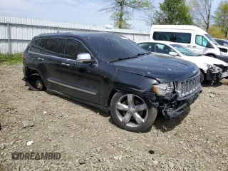 2011 Jeep Grand Cherokee Overland Summit with VIN 1J4RR6GTXBC702502, listed as a Copart auction lot 54712375 with 172,467 mi miles and Clean Title. Bid and sale history available at carsss.com. Image 4.