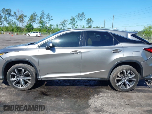 2019 Lexus RX 350 with VIN 2T2ZZMCA7KC150880, listed as a IAAI auction lot 42053536 with 55,573 mi miles and . Bid and sale history available at DreamBid. Image 14.