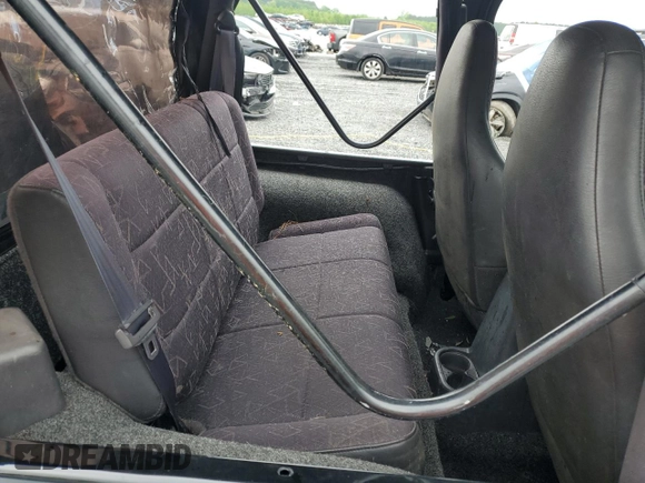 2002 Jeep Wrangler Sport with VIN 1J4FA49S12P730135, listed as a Copart auction lot 54477835 with 148,153 mi miles and Salvage title. Bid and sale history available at DreamBid. Image 10.