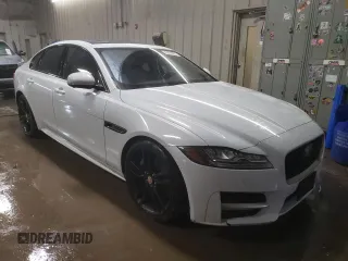 2016 Jaguar XF with VIN SAJBL4BV5GCY00349, listed as a Copart auction lot 83692684 with 71,741 mi miles and Salvage Title. Bid and sale history available at DreamBid. Image 4.