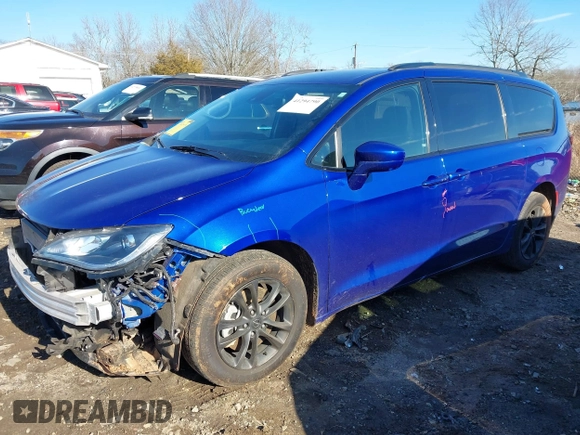 2020 Chrysler Pacifica Launch Edition with VIN 2C4RC3BG1LR123861, listed as a IAAI auction lot 41294790 with 56,007 mi miles and . Bid and sale history available at DreamBid. Image 2.