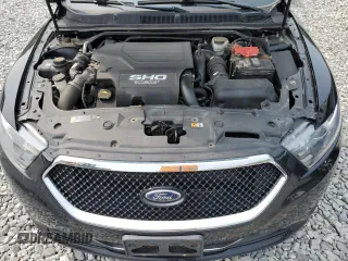 2016 Ford Taurus SHO z VIN 1FAHP2KT4GG118397, wystawiony jako Copart lot #59911415 z przebiegiem 136 530 mil mil oraz Czysty tytuł • Clean title. Historia ofert i sprzedaży dostępna na DreamBid. Obrazek 12.