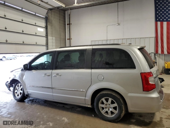 2012 Chrysler Town & Country Touring-L with VIN 2C4RC1CG0CR165795, listed as a Copart auction lot 48357175 with 134,720 mi miles and Salvage Title. Bid and sale history available at carsss.com. Image 2.