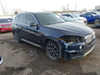 2015 BMW X5 xDrive35i z VIN 5UXKR0C58F0K54603, wystawiony jako IAAI lot #41406991 z przebiegiem 166 075 mil mil oraz . Historia ofert i sprzedaży dostępna na DreamBid. Obrazek 1.