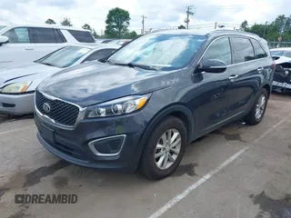 2016 Kia Sorento LX with VIN 5XYPG4A3XGG117695, listed as a IAAI auction lot 42158518 with 86,318 mi miles. Bid and sale history available at carsss.com. Image 2.