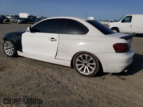 2010 BMW 1 Series 128i with VIN WBAUP9C54AVL89039, listed as a Copart auction lot 50907955 with 135,655 mi miles and Salvage Title. Bid and sale history available at DreamBid. Image 2.