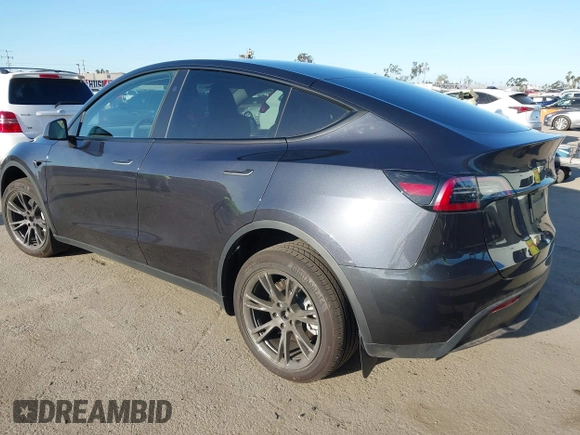 2024 Tesla Model Y with VIN 7SAYGDED5RF103983, listed as a IAAI auction lot 41933836 with 11,398 mi miles and . Bid and sale history available at DreamBid. Image 3.