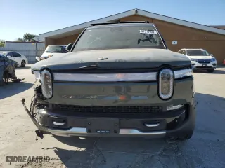 2022 Rivian R1S Launch Edition with VIN 7PDSGABL6NN000590, listed as a Copart auction lot 61510904 with 0 mi miles and Salvage Title. Bid and sale history available at carsss.com. Image 5.