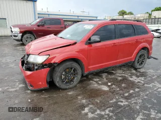 2019 Dodge Journey SE with VIN 3C4PDCBB1KT872339, listed as a Copart auction lot 61421265 with 77,157 mi miles and Salvage title. Bid and sale history available at DreamBid. Image 1.