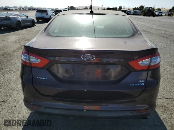 2013 Ford Fusion SE Hybrid z VIN 3FA6P0LU6DR365363, wystawiony jako Copart lot #62325625 z przebiegiem 226 624 mil mil oraz Czysty tytuł • Clean title. Historia ofert i sprzedaży dostępna na DreamBid. Obrazek 6.