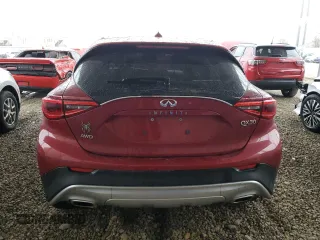 2018 Infiniti QX30 Premium with VIN SJKCH5CR7JA061030, listed as a Copart auction lot 86605824 with 94,717 mi miles and Clean title. Bid and sale history available at DreamBid. Image 6.