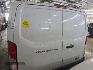 2016 Ford Transit Cargo with VIN 1FTYE1ZM1GKA06047, listed as a IAAI auction lot 42679265 with 124,601 mi miles and . Bid and sale history available at DreamBid. Image 3.