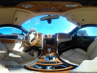 2008 Bentley Continental GT with VIN SCBCP73W28C056486, listed as a IAAI auction lot 40784814 with Not Provided miles and . Bid and sale history available at DreamBid. Image 18.