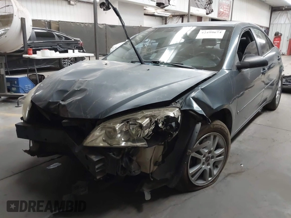 2006 Pontiac G6 6-Cyl z VIN 1G2ZG558464257988, wystawiony jako IAAI lot #42499674 z przebiegiem Nie podano mil oraz . Historia ofert i sprzedaży dostępna na DreamBid. Obrazek 18.