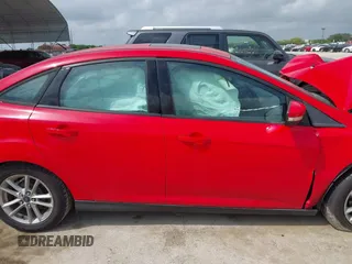2015 Ford Focus SE z VIN 1FADP3F23FL233620, wystawiony jako IAAI lot #42073204 z przebiegiem 129 109 mil mil oraz . Historia ofert i sprzedaży dostępna na DreamBid. Obrazek 13.