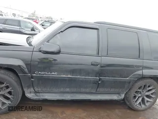 2000 Cadillac Escalade z VIN 1GYEK63R8YR188250, wystawiony jako IAAI lot #41412615 z przebiegiem 190 542 mil mil oraz . Historia ofert i sprzedaży dostępna na DreamBid. Obrazek 14.