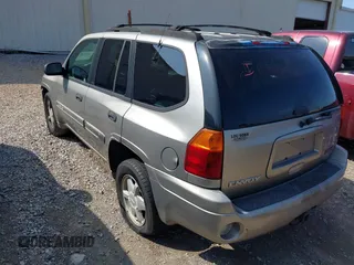 2003 GMC Envoy SLT z VIN 1GKDS13S932106295, wystawiony jako IAAI lot #41594814 z przebiegiem 199 597 mil mil oraz . Historia ofert i sprzedaży dostępna na DreamBid. Obrazek 6.