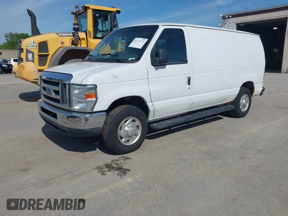 2014 Ford Econoline Cargo Commercial with VIN 1FTNE2EW2EDA18970, listed as a IAAI auction lot 42375174 with 174,022 mi miles and . Bid and sale history available at DreamBid. Image 2.