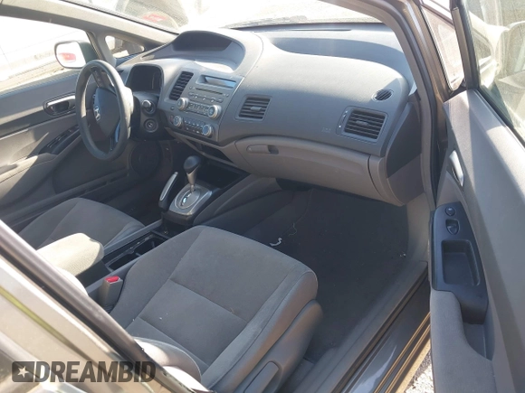 2006 Honda Civic LX with VIN 1HGFA16526L051492, listed as a IAAI auction lot 42170205 with 133,773 mi miles and . Bid and sale history available at DreamBid. Image 5.